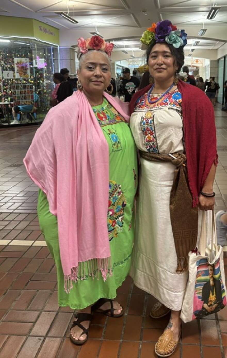 Nina Guerra (right) and a friend are dressed up for the Frida Kahlo look-alike contest at Frida Fest in San Antonio. Aug. 15, 2026.