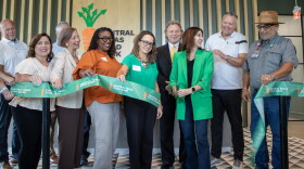 Central Texas Food Bank President and CEO Sari Vatske, center, celebrates with members of the board and City of Waco officials after the ribbon cutting for the new Waco Food Hub at 1402 Gholson Road. The ribbon cutting ceremony on Tuesday, August 24 marked the facility's official opening.