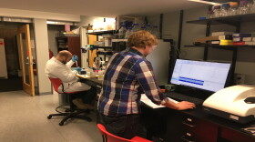 From left: Bexion Scientist Tim Stephens and Researcher Kyle Buller test a new antibody. Bexion licensed the technology from Cincinnati Children's Hospital to develop the drug BXQ-350.