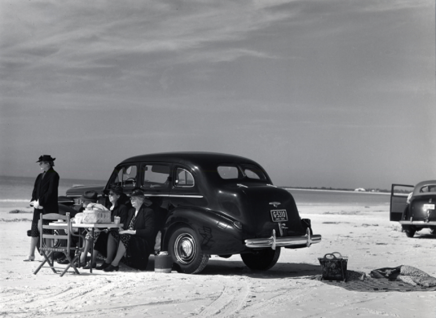 Marion Post Wolcott, Winter Visitors from Nearby Trailer Park, Picnicking Beside Car on Beach, Near Sarasota, Florida, 1941.