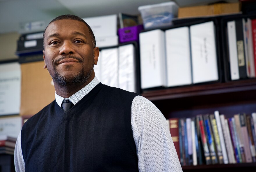 Lewis Brogdon, who directs the Institute of Black Church Studies at the Baptist Seminary of Kentucky and will present during the festival, poses in his office located at Simmons College of Kentucky in Louisville on Nov. 15, 2021.