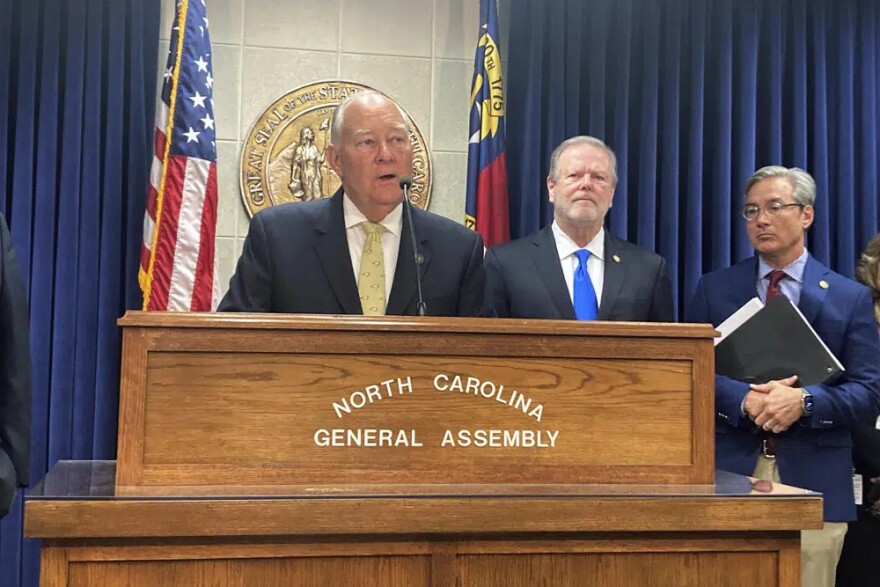 North Carolina state Sen. Brent Jackson, R-Sampson, left, speaks at a Legislative Building news conference while Senate leader Phil Berger, R-Rockingham, center, and Sen. Michael Lee, R-New Hanover, watch, Monday, May 15, 2023, in Raleigh, N.C. Senate Republicans unveiled a two-year state government budget proposal.