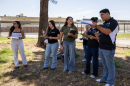 Hanford High honors agriculture students are shown sketching out plans for a monarch butterfly mural at their on-campus farm.