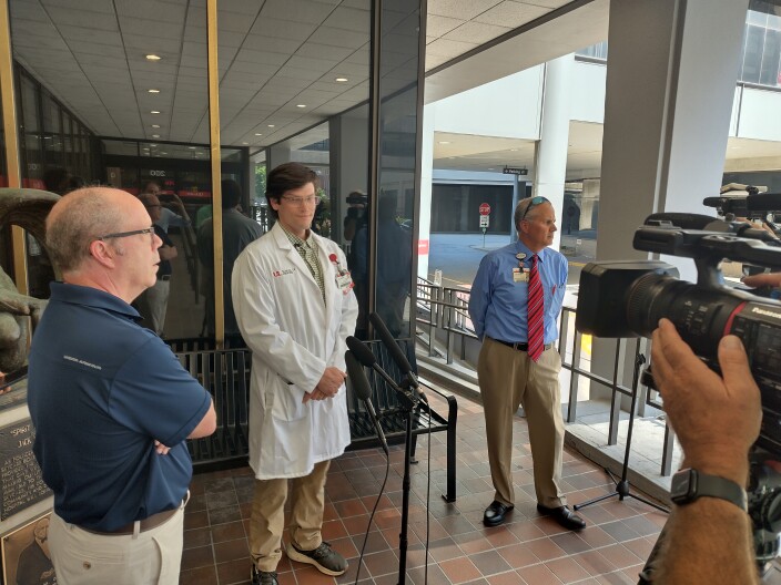 Evan Kuhl, the medical director of the UofL Health - Jewish Hospital emergency department, talking with reporters outside the downtown hospital.