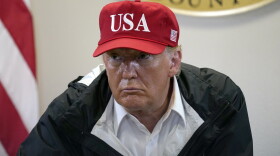 President Donald Trump listens during a briefing about Hurricane Laura with first responders at the emergency operations center Saturday, Aug. 29, 2020, in Orange, Texas. 