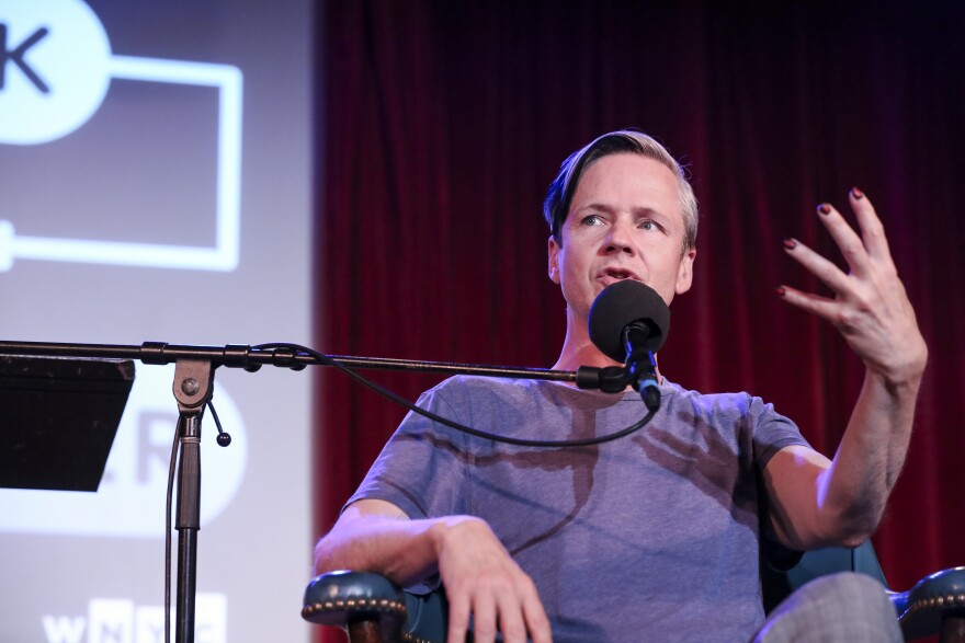 John Cameron Mitchell appears on <em>Ask Me Another</em> at the Bell House in Brooklyn, New York.