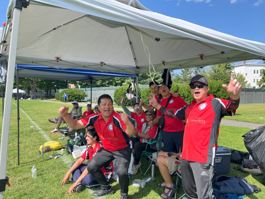 Manchester's Murraa Brothers cricket team cheers during a cricket tournament at Prout Park on Saturday.