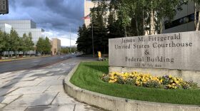 An outdoor sign reads: James M. Fitzgerald United States Courthouse & Federal Buildling