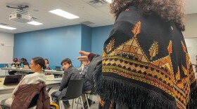 Many students spoke to student senate and student president Miguel Craven (pictured left), including Jeneen Barakat, right, urging for the student government to pass a revised resolution.