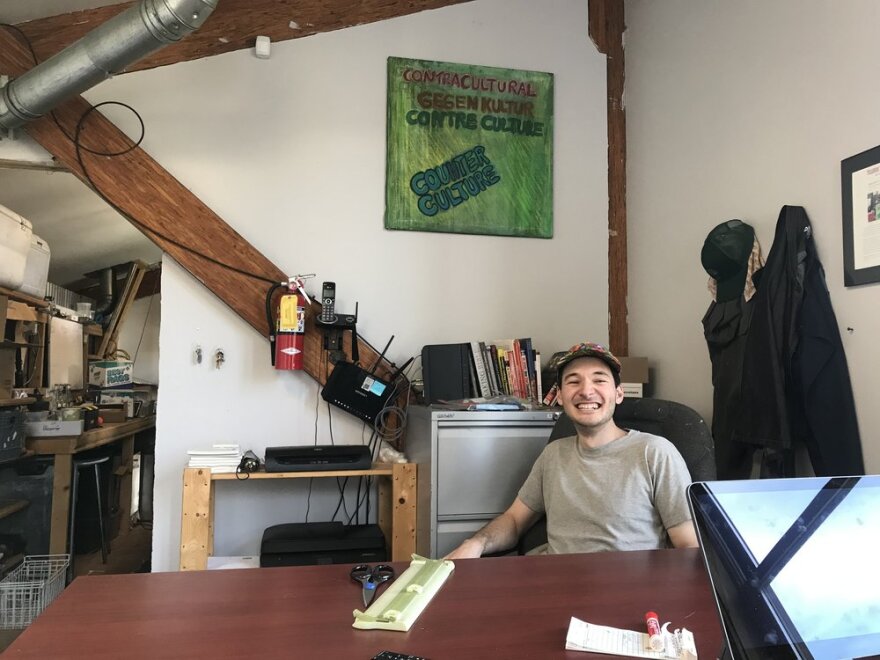 Student Taka Kondo in the back office of the Counter Culture Kitchen in Lawson, Colorado.