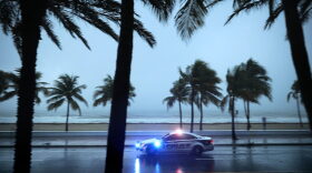 Police patrol the street running along Sebastian Street Beach ahead of the arrival of Hurricane Irma Sept. 9, 2017 in Fort Lauderdale, Fla. (Chip Somodevilla/Getty Images)