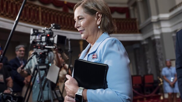 Newly-sworn Sen. Darline Graham, R-S.C., sister of Lindsey Graham, walks past cameras as she leaves the Old Senate Chamber following a cermonial oath of office ceremony allowing her to serve as her late brother's temporary replacement, at the Capitol in Washington, Tuesday, July 14, 2026, (AP Photo/J. Scott Applewhite)