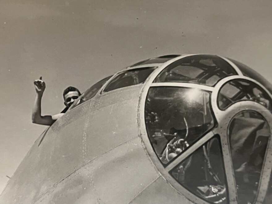 Walter Sowa is seen waving from the cockpit of Enola Gay in 1945 at the U.S. base on Tinian Island in the Pacific Ocean.