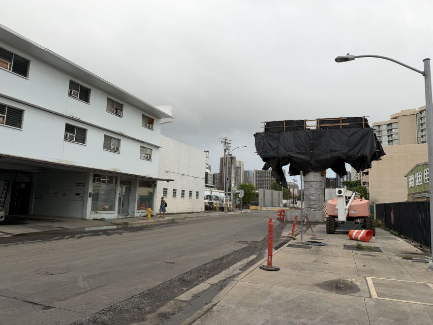 Skyline rail columns under construction in the Iwilei neighborhood of Honolulu on Thursday, Oct. 8, 2026 with downtown visible in the distance.