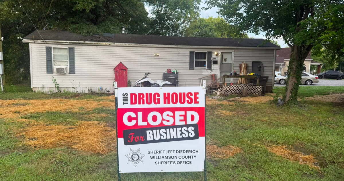 Deputies conduct a drug raid on a residence near the Carterville School District