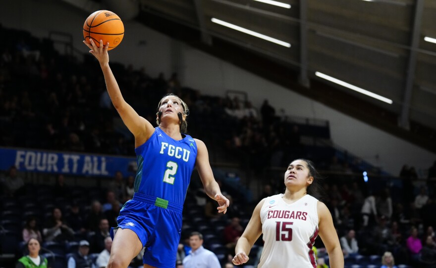 Florida Gulf Coast's Sophia Stiles, goes up for a shot against Washington State's Ula Motuga during the second half of a first-round college basketball game in the NCAA Tournament, Saturday, March 18, 2023, in Villanova, Pa. (AP Photo/Matt Rourke)