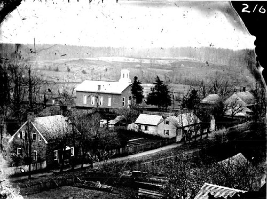 This late 1800s photo features the St. Philips African Moravian Church, recognized by its white steeple.