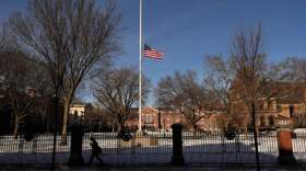The flag flies at half-staff as a sign of mourning for the victim's of Saturday's shooting, on the campus of Brown University, Monday, Dec. 15, 2025, in Providence, R.I. (Robert F. Bukaty/AP)