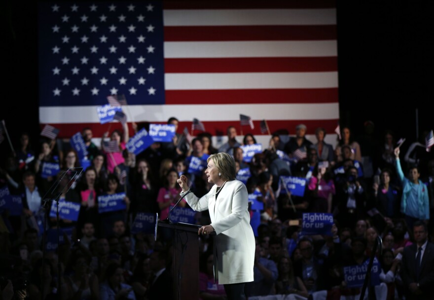 Democratic presidential candidate Hillary Clinton addresses supporters at her Super Tuesday election night rally in Miami, Fla.