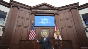Republican Senate President Ben Albritton answers questions from reporters inside the senate chamber at the state capitol in Tallahassee, Fla., on the opening day of the 2025 legislative session, Tuesday, March 4, 2025. 