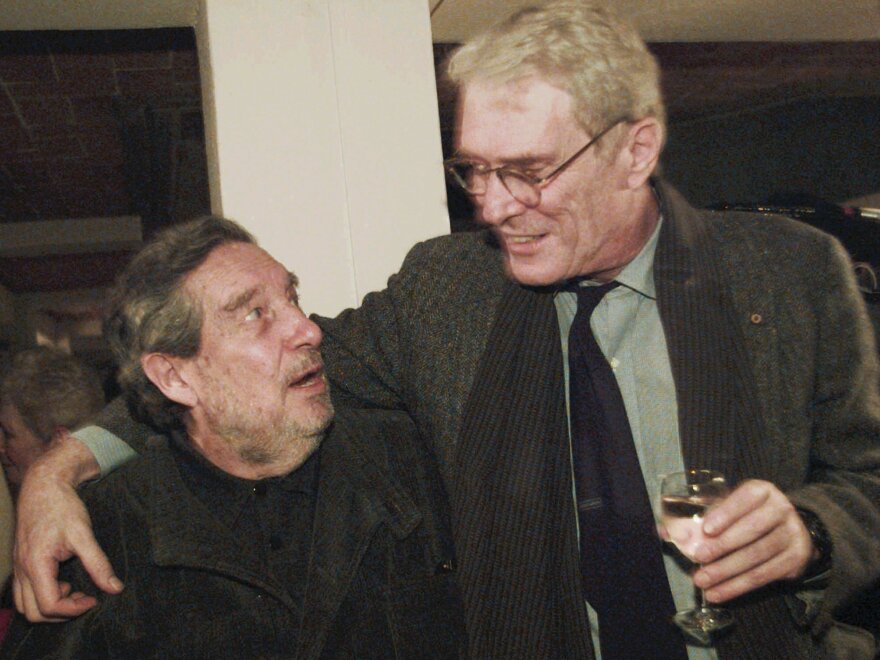 Former U.S. Poet Laureate Mark Strand (right) with Mexican author and Nobel Prize winner for literature, Ocatavio Paz, at Johns Hopkins University in Baltimore, in 1995. Strand has died of cancer at age 80.