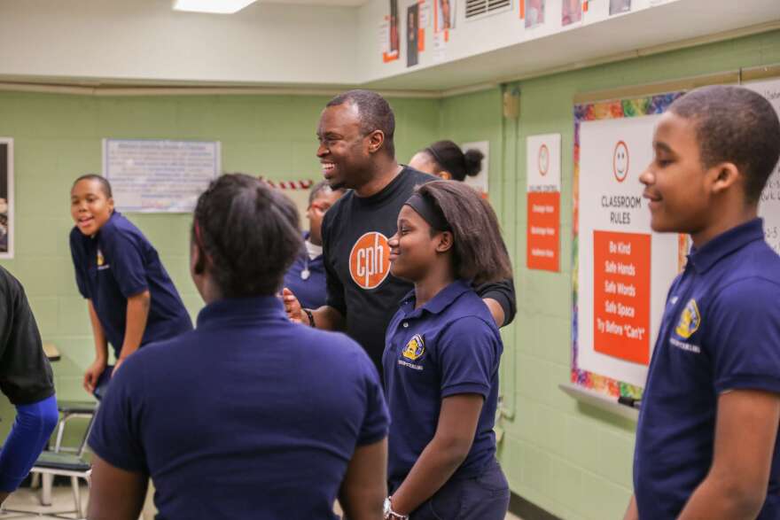 Cleveland Play House teaching artist Eugene Sumlin working with students from Marion-Sterling school [courtesy: Cleveland Play House]