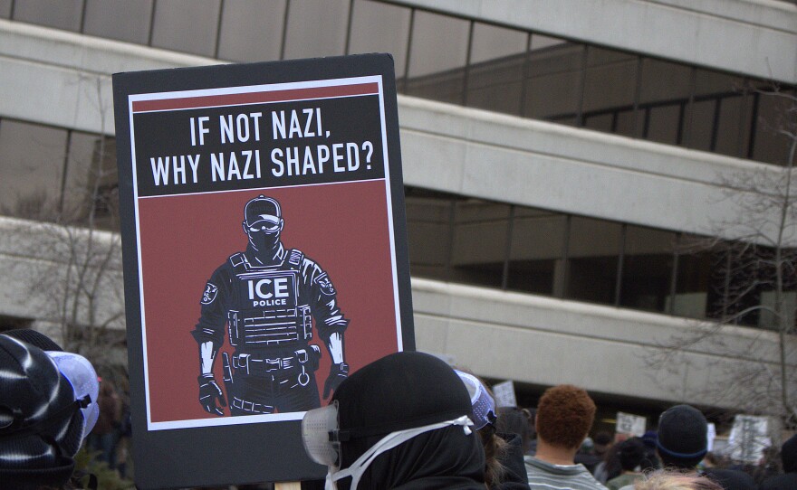 Protesters near the entrance to the federal building in Eugene on Friday, Jan. 30, 2026.