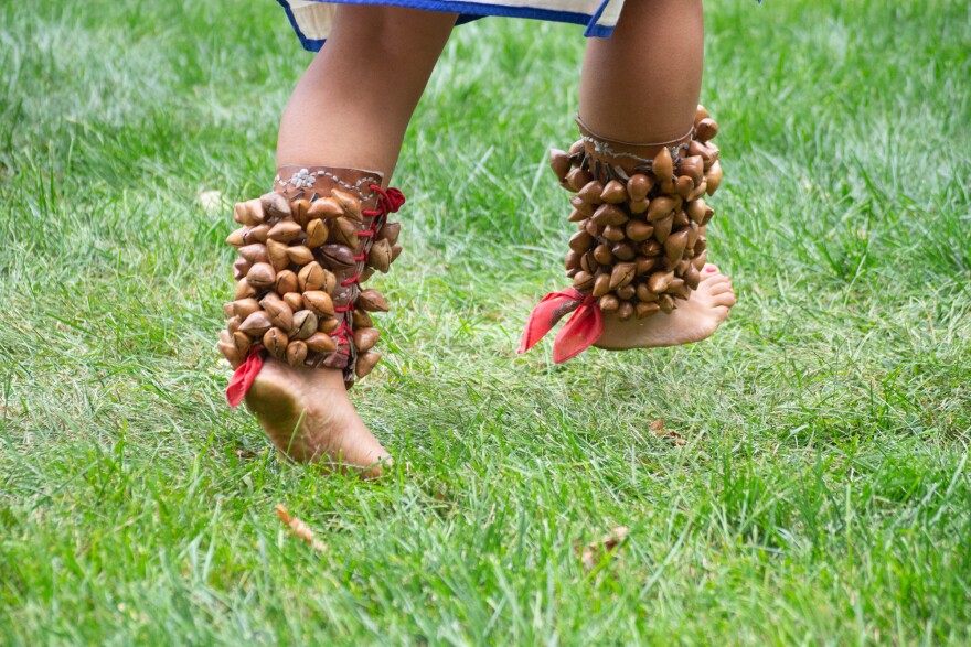 The coyoleras add percussion to their steps.