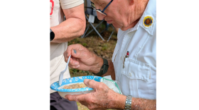Ronald Rife, chaplain of the Joseph Freeman Post 476 of the American Legion, enjoys a second bowl of the soup beans during the annual Wilkesville Bean Soup Dinner.