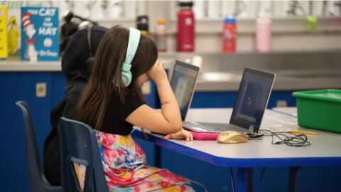 First graders work on assignments on laptops at Epic Charter Schools' Stonegate Virtual Learning Center in Oklahoma City on Feb. 28, 2023.