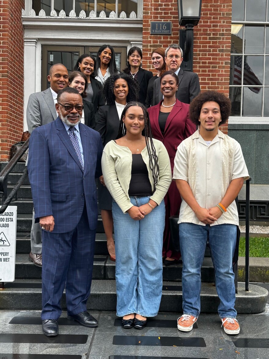 Plaintiffs and their legal team outside the U.S. Western District of Virginia courthouse last year, following the motion to dismiss hearing. Pictured left to right in front: Reverend Cozy Bailey, President of the Virginia chapter of the NAACP, and Shenandoah County students Briana Brown and A.D. Carter, V. Pictured left to right in the middle row: Ryan Downer and attorneys Li Reed and Marja Plater. (The rest of the legal team is behind)