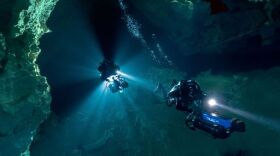 Divers with the Woodville Karst Project exploring the connection between 2 massive cave systems under Wakulla County.