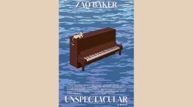 Cover of "Unspectacular" by Zaq Baker; illustration of an upright piano partially submerged in water with a cat laying on top