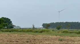 A wind turbine rises above farmland in Chowan County, N.C. on Tuesday, Sept. 24, 2024.