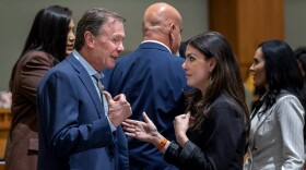 Rep. Mark Murphy, R-Roswell, left, talks with House Majority Whip Dayan Hochman-Vigil, D-Albuquerque, on the House floor in this October 2025 file photo. Murphy abruptly withdrew from his reelection campaign this week.
