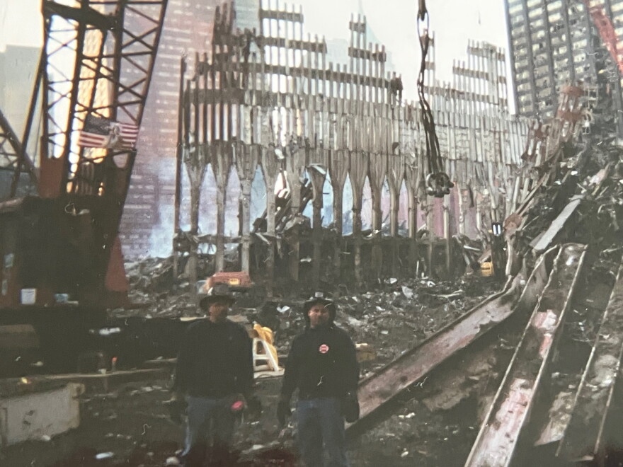 Firefighters pictured at Ground Zero in early October 2001.