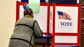 A voter in Louisville, Kentucky fills out their ballot for early voting during the November 2024 election.