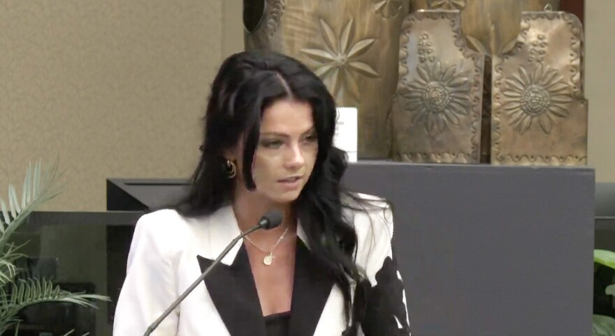 Ashley LaChance addresses the Orange County Commission about regulating e-bikes and e-scooters on Tuesday, May 19, 2026. On Mother’s Day, a truck struck LaChance’s teenage son, Colton Remsburg, while he was riding an electric scooter. He later died from his injuries.