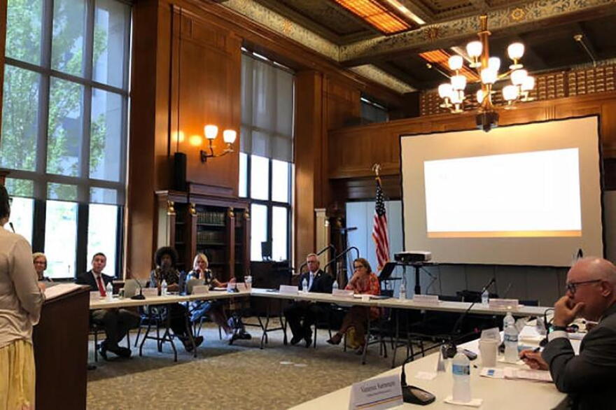 Members of the commission include state lawmakers, Indiana Supreme Court Justice Loretta Rush and state health officials.