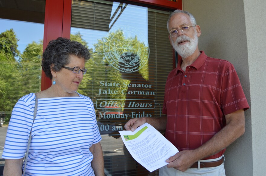 Pam and Toby Short with the letter they brought to State Sen. Jake Corman asking him to help pass redistricting reform.