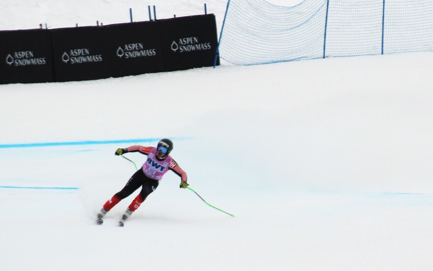 Canadian ski racer James Crawford skis into the finish area of the Stifel America's Downhill course at Aspen Mountain on March 3, 2023. Crawford was one of only 23 competitors in a field of 59 who made it down the hill before deteriorating conditions prompted officials to call off the race and scratch the results.