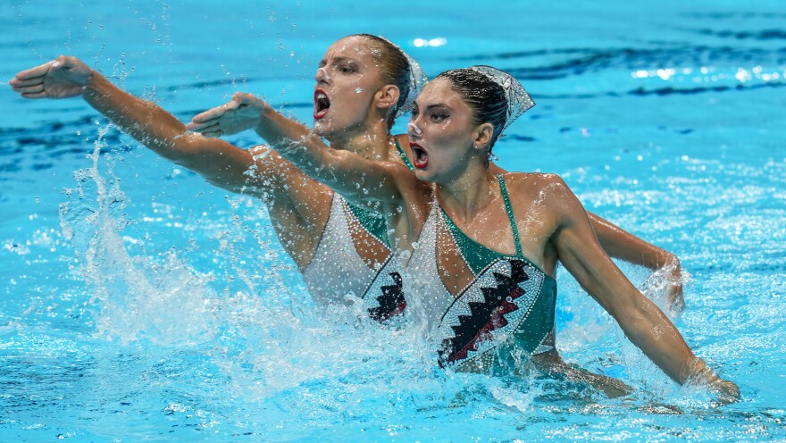 TOKYO, JAPAN - AUGUST 02: Greece's Evangelia Papazoglou and Greece's Evangelia Platanioti compete in the preliminary for the women's duet free artistic swimming event during the Tokyo 2020 Olympic Games at the Tokyo Aquatics Centre in Tokyo on August 2, 2021. (Photo by Alexander Safonov/Anadolu Agency via Getty Images)