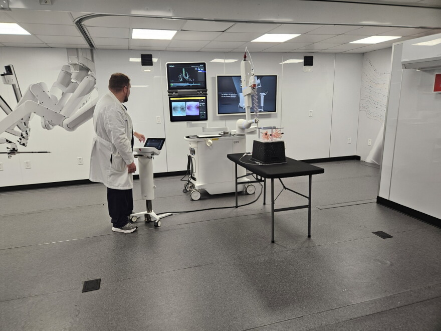 Dr. Fyffe demonstrating the Ion machine.