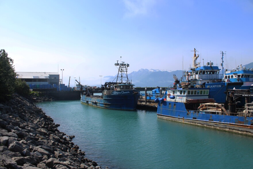 The sun shines on moored ships near the JAG Alaska shipyard on Monday, Aug. 10, 2026 in Seward, Alaska.