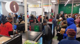 Hundreds of people jam the grand opening on the new North Flint Food Market