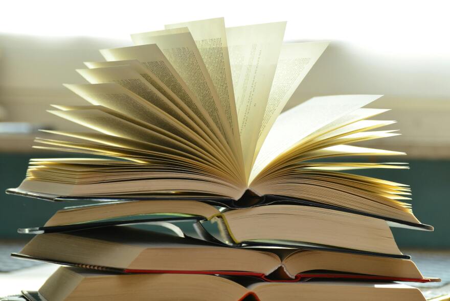 A book's pages fan out