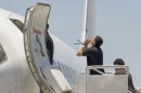 This photo released by the El Salvador's presidential press office shows men, who El Salvador's government identify as Venezuelans who the U.S. government detained and flew to El Salvador months ago, boarding a Venezuelan plane bound for Venezuela at the Oscar Arnulfo Romero International Airport in San Luis Talpa, El Salvador, Friday, July 18, 2025. (El Salvador's presidential press office via AP)