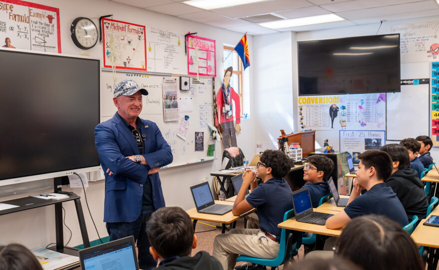 Kelly addresses a classroom at Southwest Early College Academy.