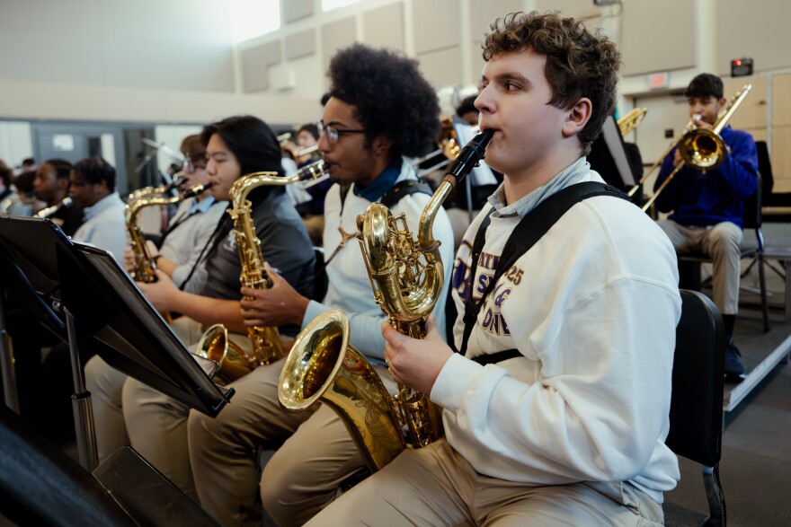 Jack Simms, a freshman baritone saxophone player at Christian Brothers College High School, rehearses “Sleigh Ride” ahead of Grammy Award-winning saxophonist Kenny G’s visit on Wednesday, Dec. 3, 2025, at the school in Town and Country.