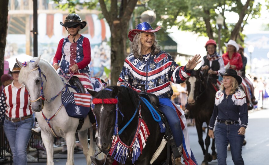 Horseback riders make their way down West Fourth Street for the Little League World Series parade on Tuesday.